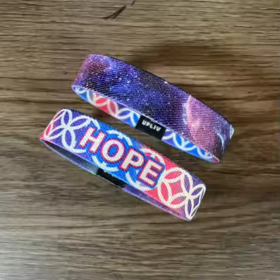 UPliv Wristband -- Your daily inspiration, one tap away